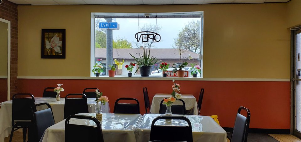 Dine-in tables inside a quiet, trendy restaurant.